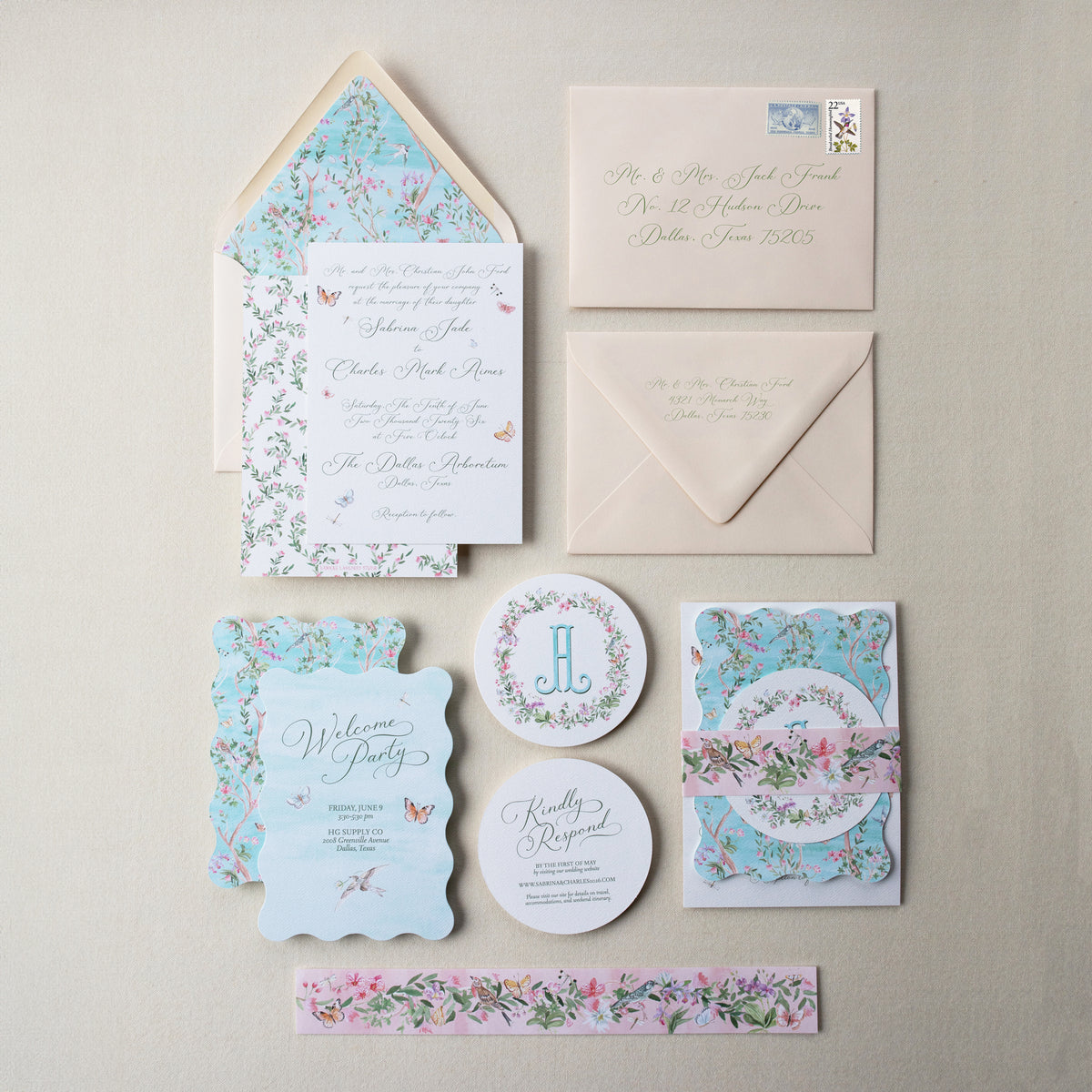 Set of floral and decorative stationery items on a neutral background