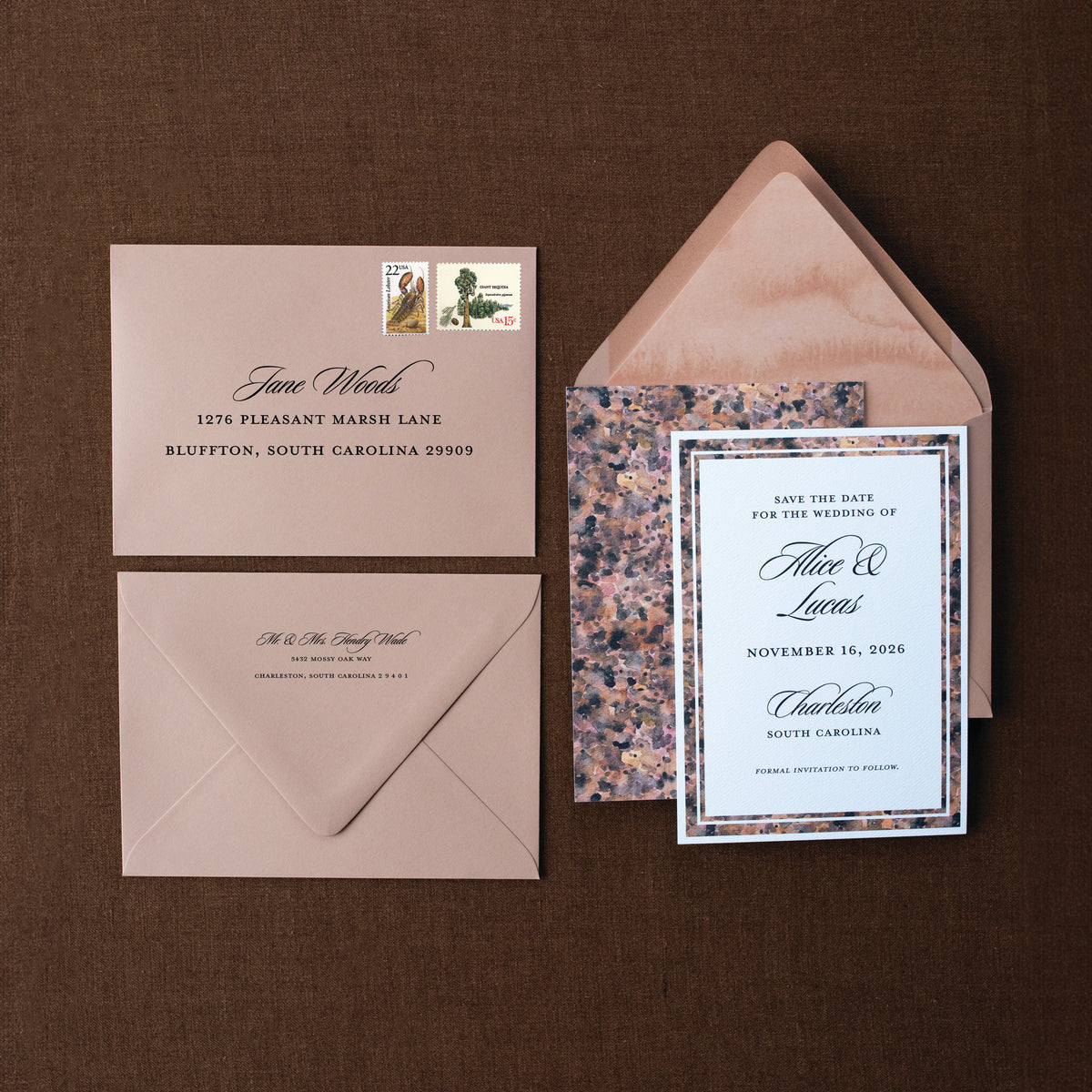 Wedding invitation set with envelopes on a brown background