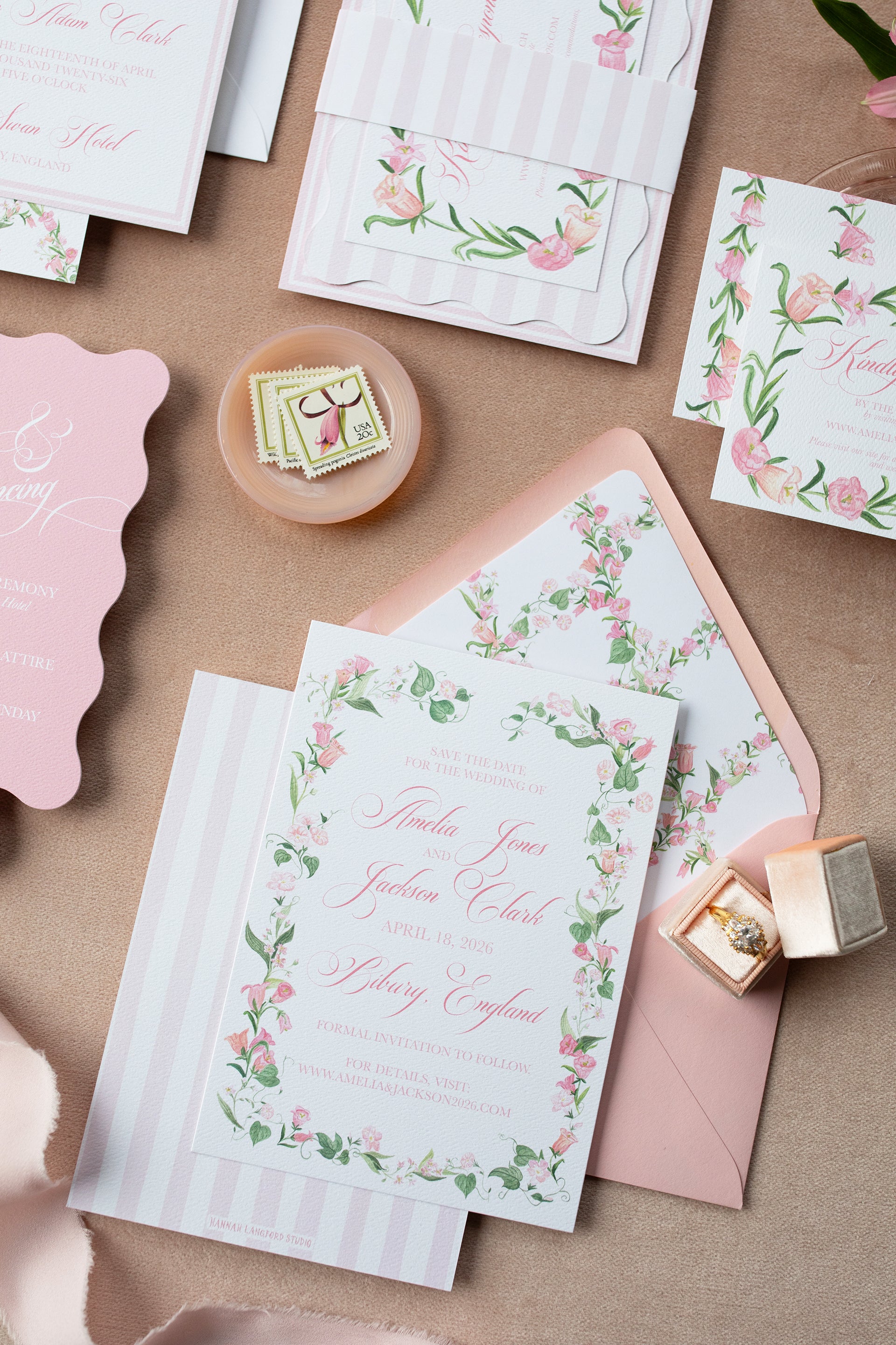 Stationery set with floral designs on a beige surface