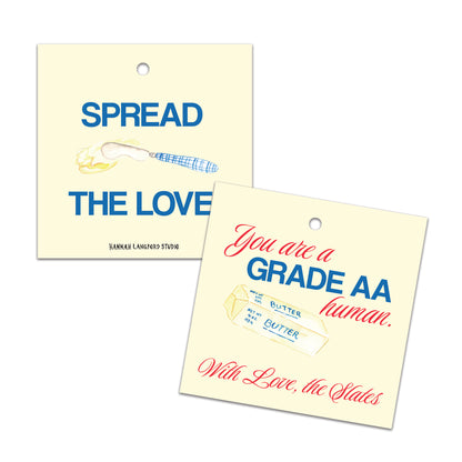 Two butter-themed yellow tags with humorous text and graphics on a white background