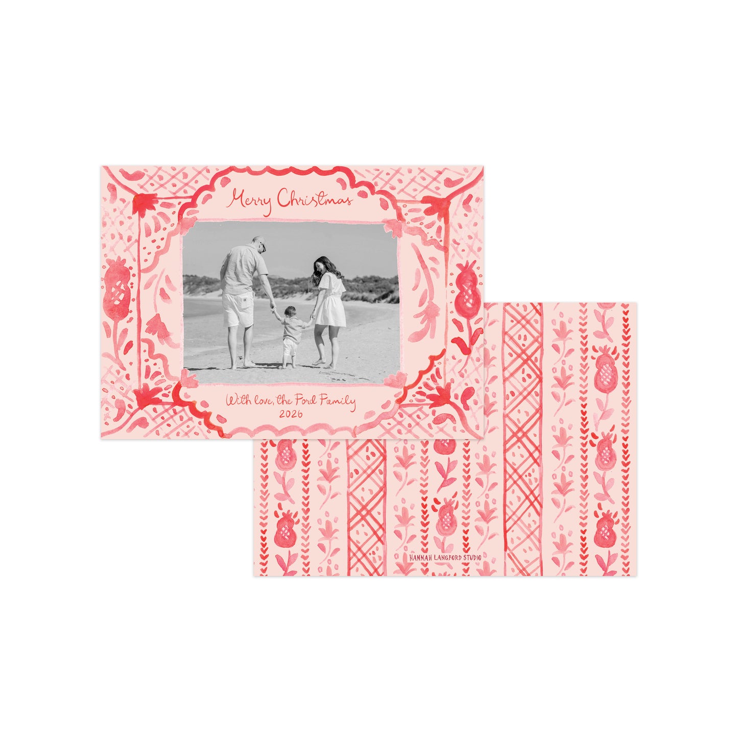 A pink and coral Christmas photo card set shown on a white background, including a front card with a family photo and two matching patterned card backs.