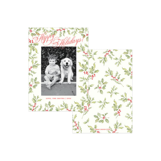 Two holiday photo cards with a green holly and red berries pattern on a cream background.
