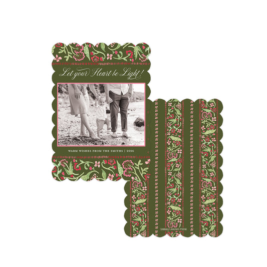 A set of holiday-themed scrapbooking cards with scalloped edges, featuring a green and red floral pattern, a central photo placeholder, and decorative text on a plain white background.