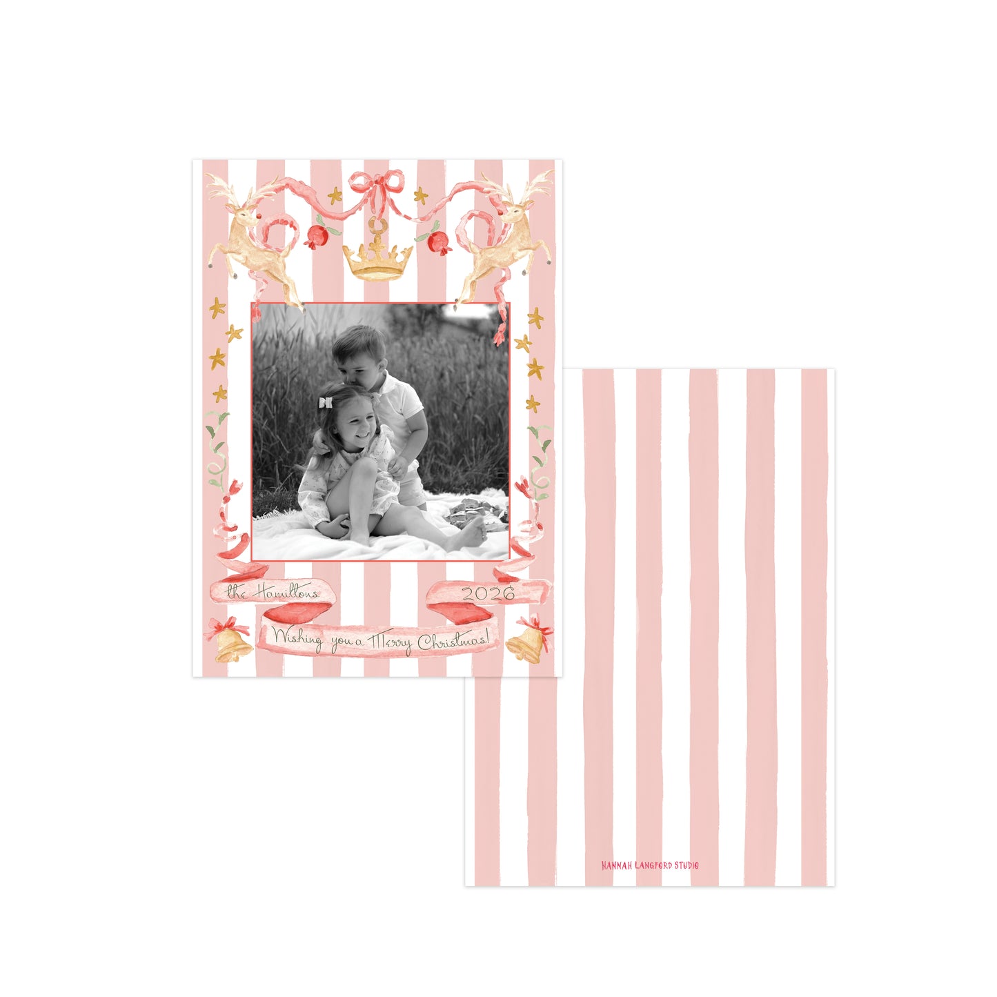 A pink and white striped Christmas card featuring reindeer and holiday motifs.
