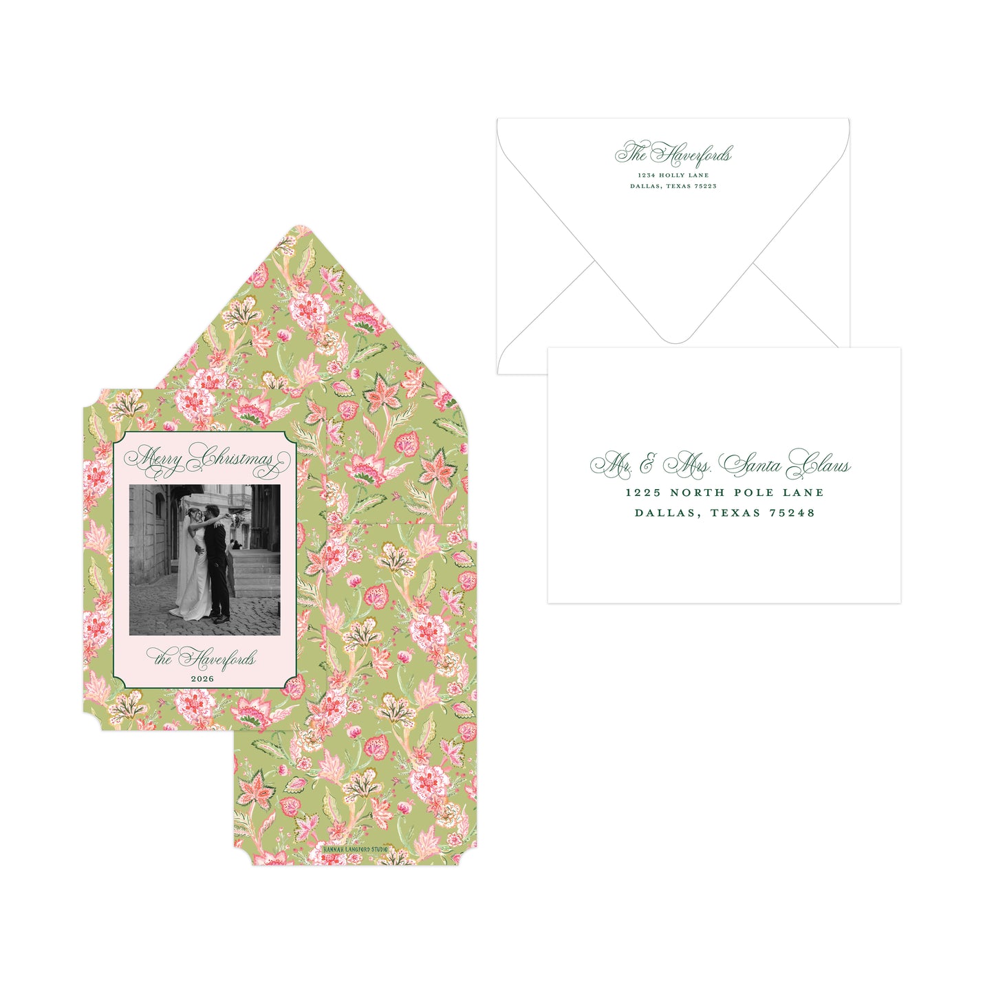 A Christmas stationery set layout on a white background, featuring a floral-patterned envelope with a photo insert, a matching floral inner envelope, and a white envelope with printed text.