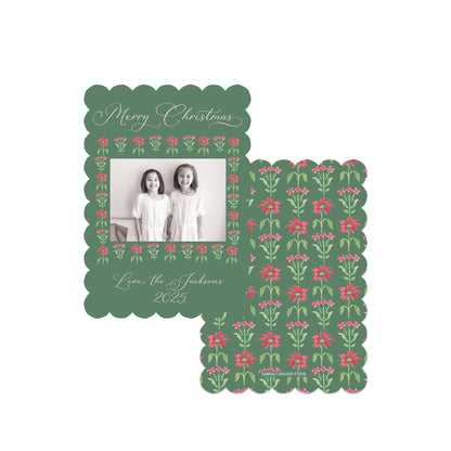 A personalized Christmas photo card set featuring a scalloped green card with a floral border, a central photo slot, and a matching patterned card backing, shown on a plain white background.