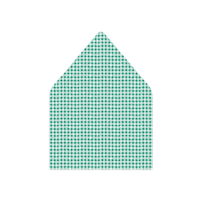 A green and white gingham patterned envelope flap with a pointed top, shown on a plain white background.