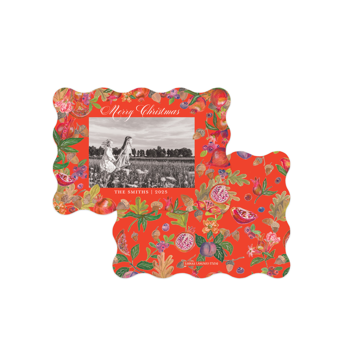 Two decorative scalloped photo frames with a bright red background and an allover botanical print of pomegranates, and leaves.