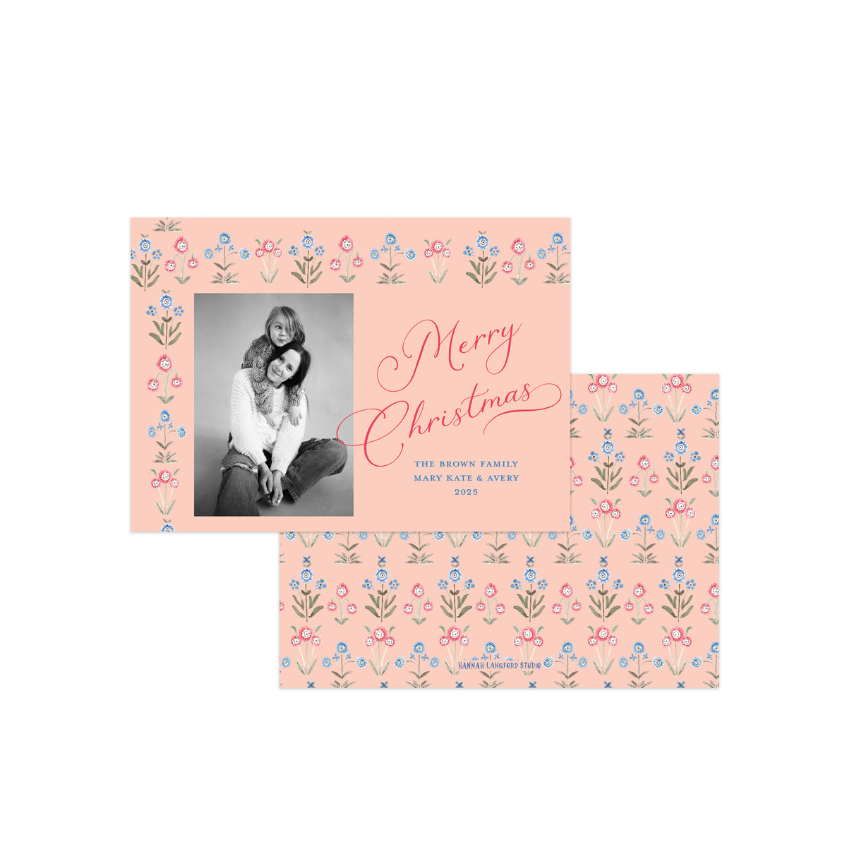 A personalized holiday card set featuring a peach-colored card with a floral border, a black-and-white family photo, and red cursive 'Merry Christmas' text, shown alongside a matching patterned envelope on a white background.