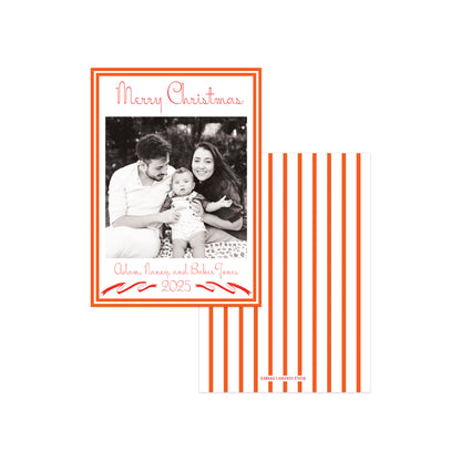 A holiday photo card set on a white background, featuring one card with a black-and-white family photo, orange border, and red script text reading 'Merry Christmas' and '2025,' alongside a second card with orange and white vertical stripes.