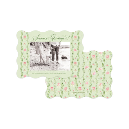 Two personalized photo cards with scalloped edges, featuring a light green background decorated with pink flowers and green leaves. 