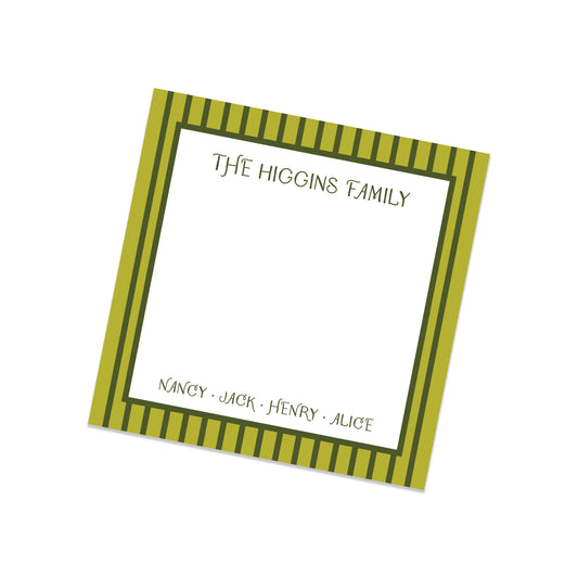 Personalized notepad with striped border and family name on a white background