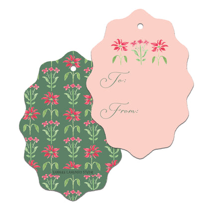 Two floral gift tags, one green with pink flowers and the other pink with green flowers, on a white background.