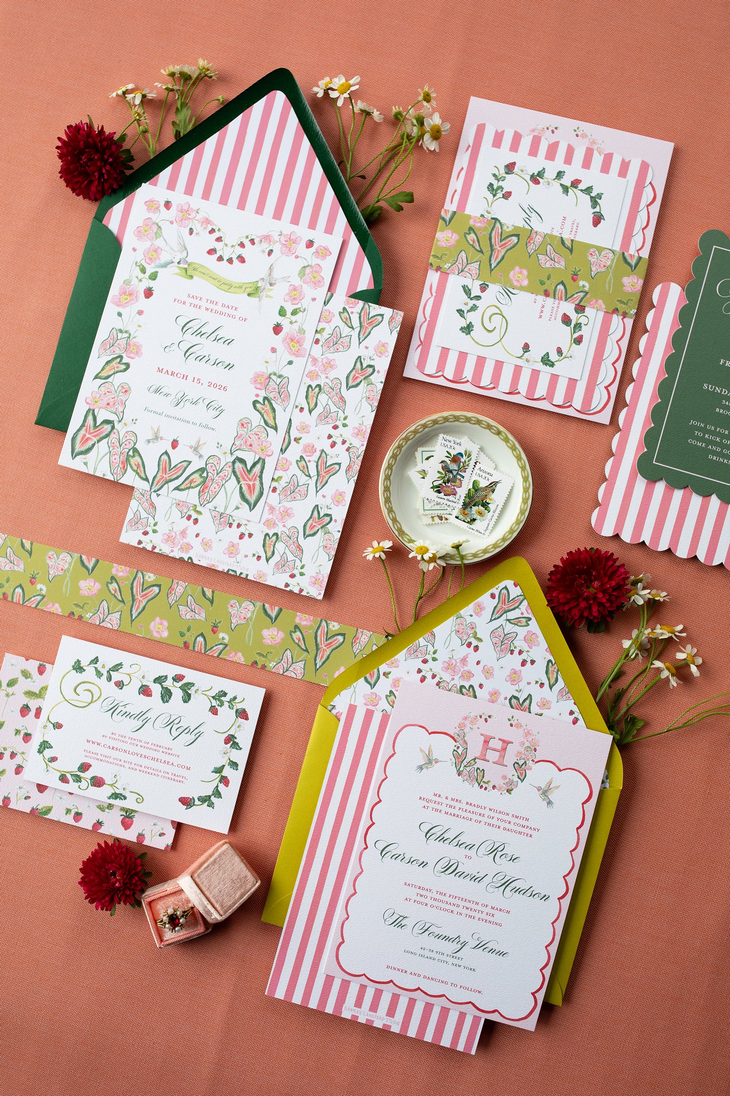 Set of floral and striped invitations on a pink background