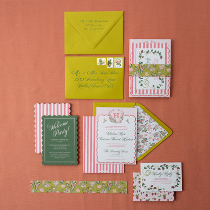 Collection of colorful stationery items including envelopes and cards on a red background