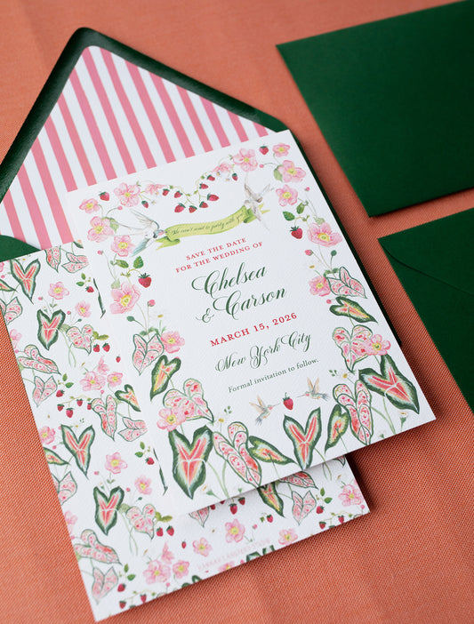 floral wedding invitation on an orange background