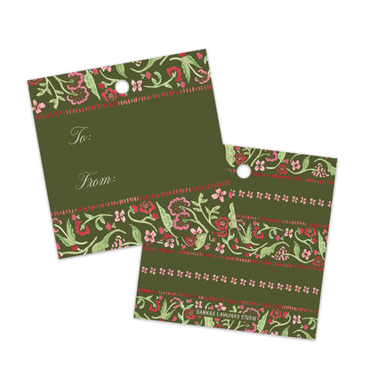 Two olive green gift tags with a red and pink floral border pattern, one showing the front with 'To:' and 'From:' text, and the other showing the patterned reverse side, on a white background.