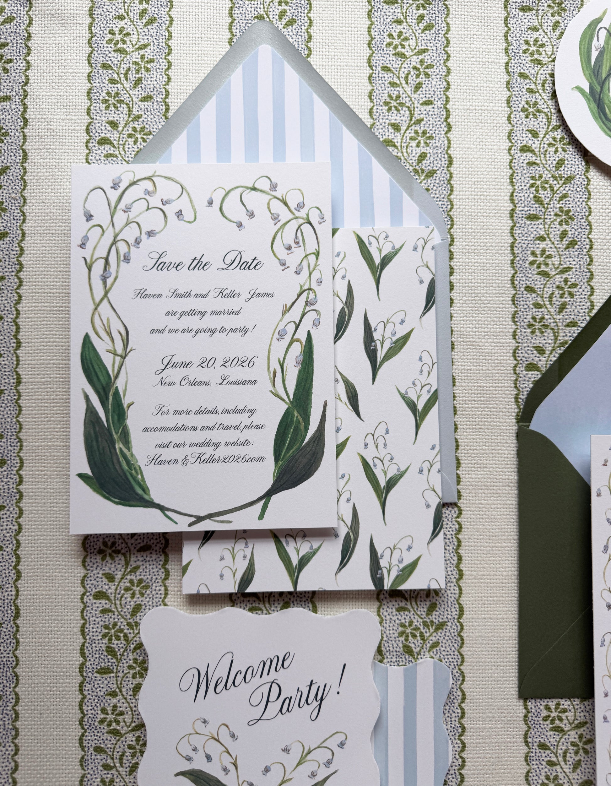 Wedding invitation set with floral design on a textured background