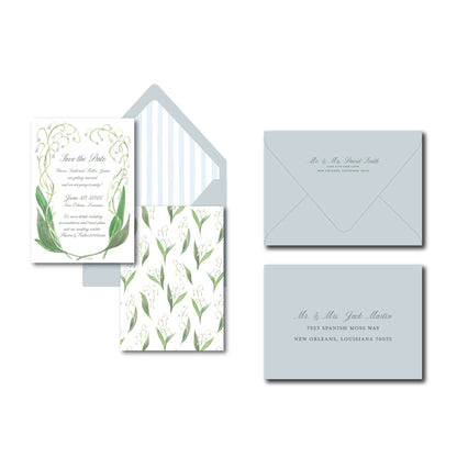 Lily of the Valley wedding invitation featuring hand-painted florals and a soft blue stripe.