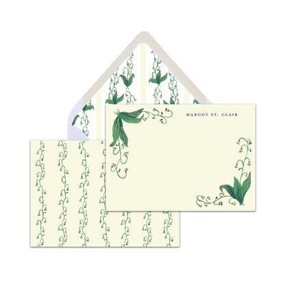 Stationery set with floral design on a white background