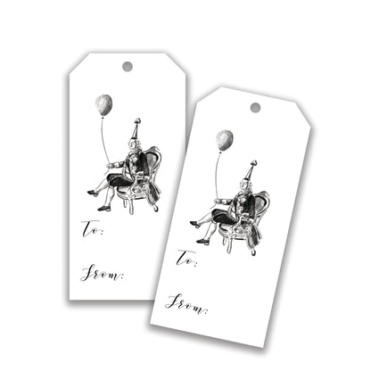 Gift tag featuring black and white illustration of a king sitting in a chair.