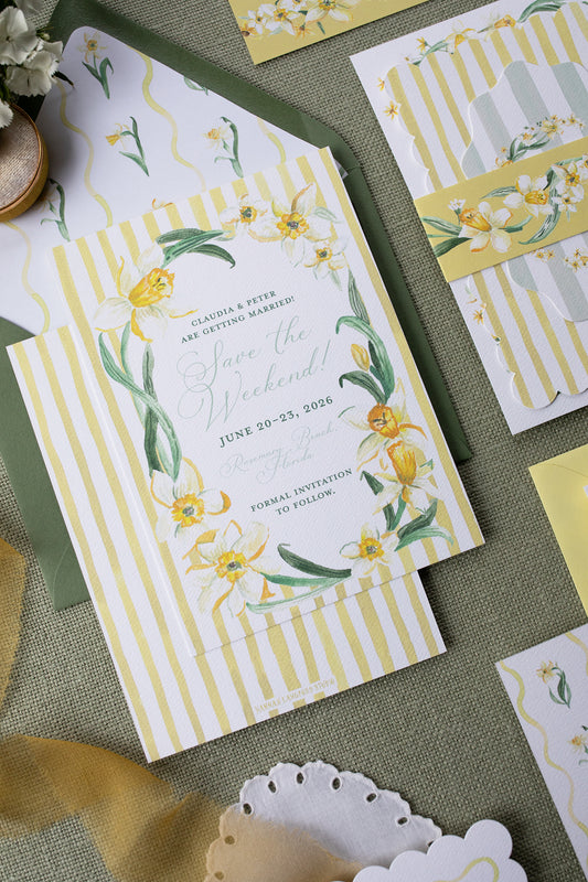 Wedding invitation with floral design on a textured surface