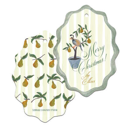 Decorative Christmas tag with pear pattern and bird illustration on a white background