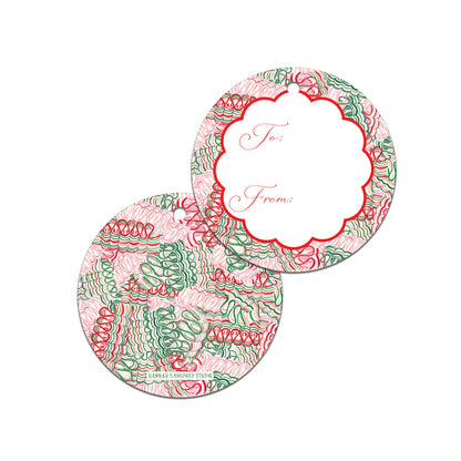 Two circular gift tags with pink and green pattern on a white background