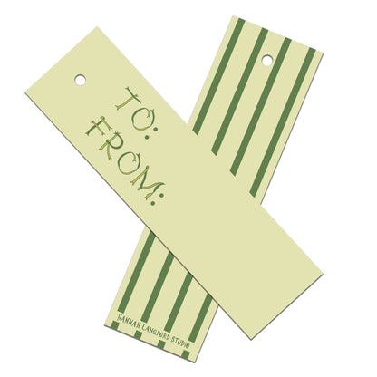 Two green gift tags with 'TO:' and 'FROM:' text on a white background.