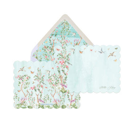Floral and nature-themed stationery set with an envelope and cards on a white background