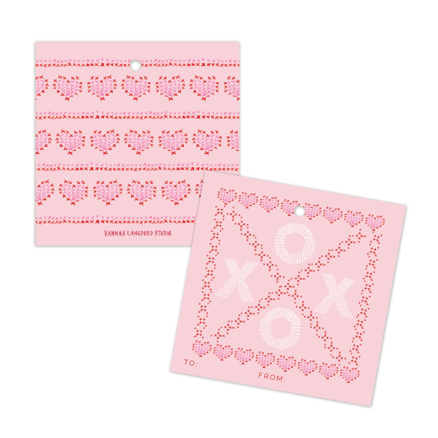 Two pink cards with heart patterns on a white background
