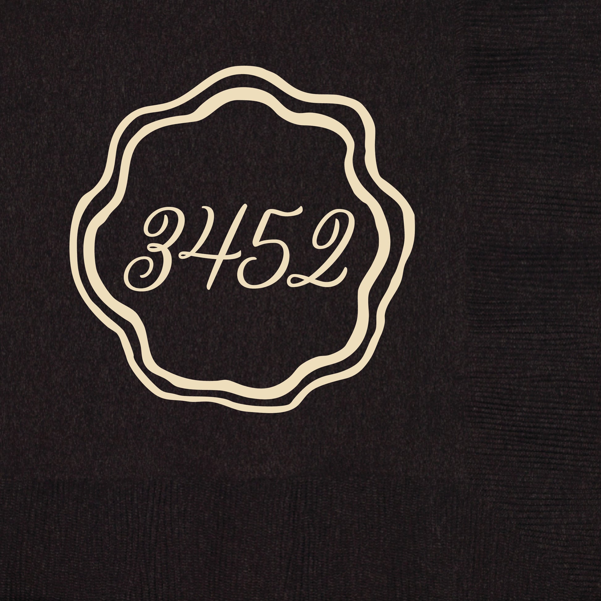 beverage napkin with a round scalloped design