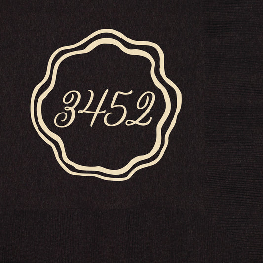 beverage napkin with a round scalloped design