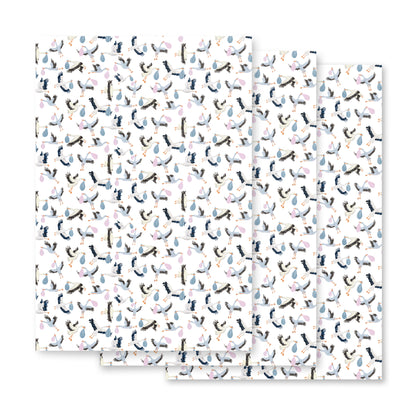 wrapping paper with stork illustrations