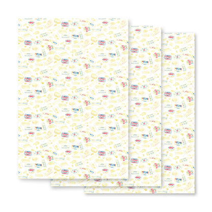 butter themed wrapping paper on a white background
