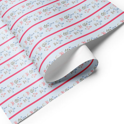 blue and pink wrapping paper with flower illustrations.