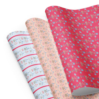 blue and pink wrapping paper with flower illustrations.
